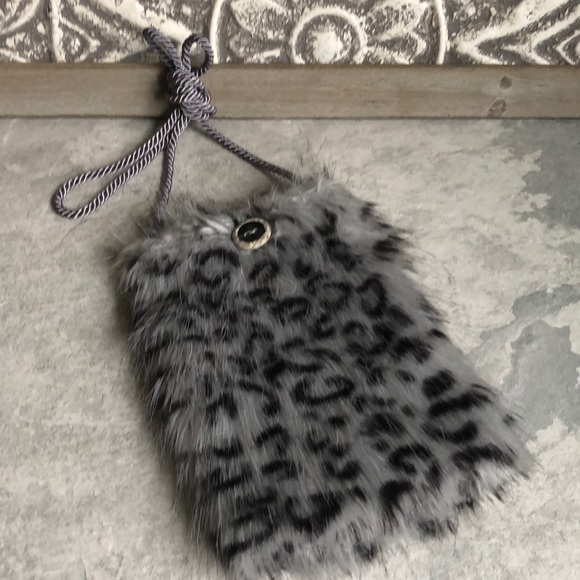 Handbags - Leopard print grey and black faux fur crossbody.